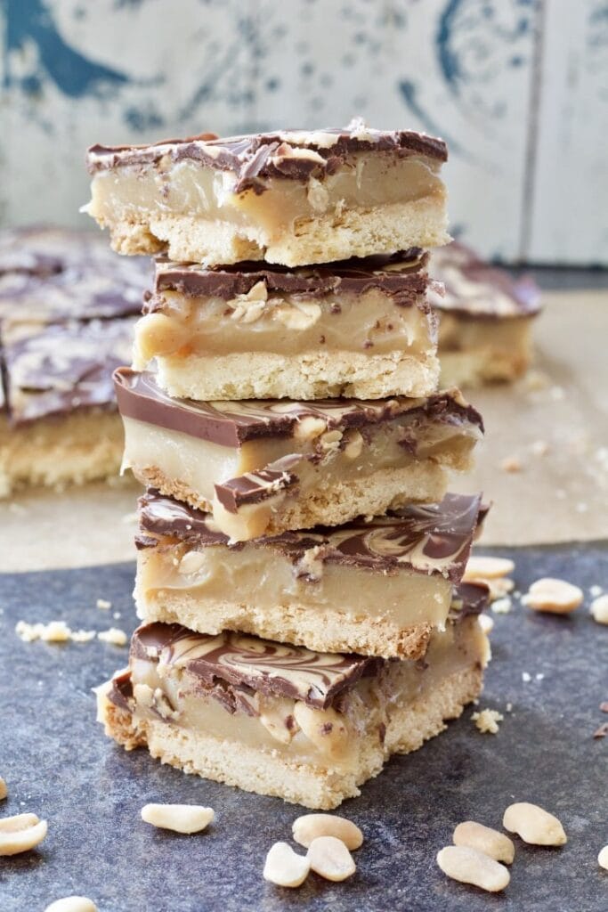 Millionaire's shortbread slices pilled up.