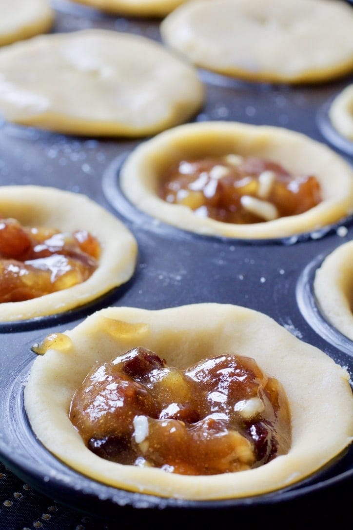 Unbaked mince pie without pastry top on.