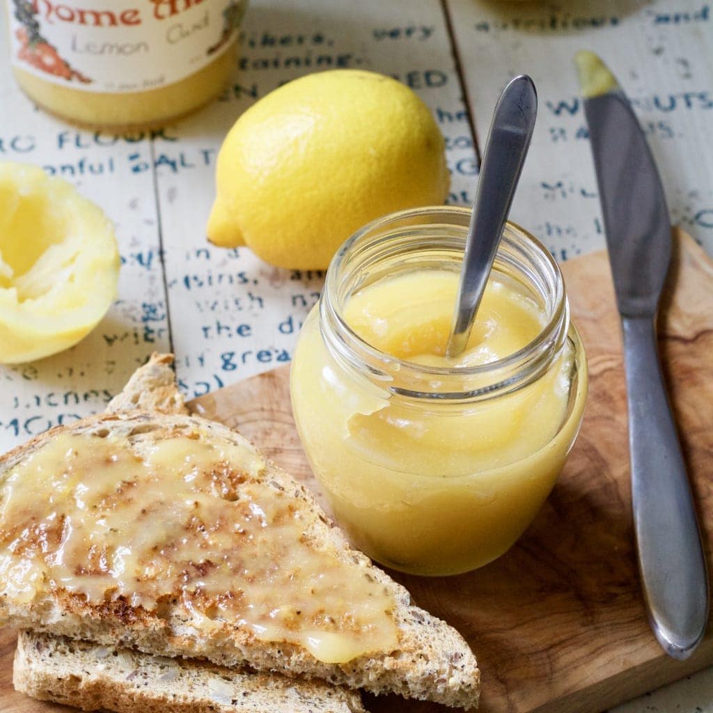 Lemon curd in a jar and on toast.