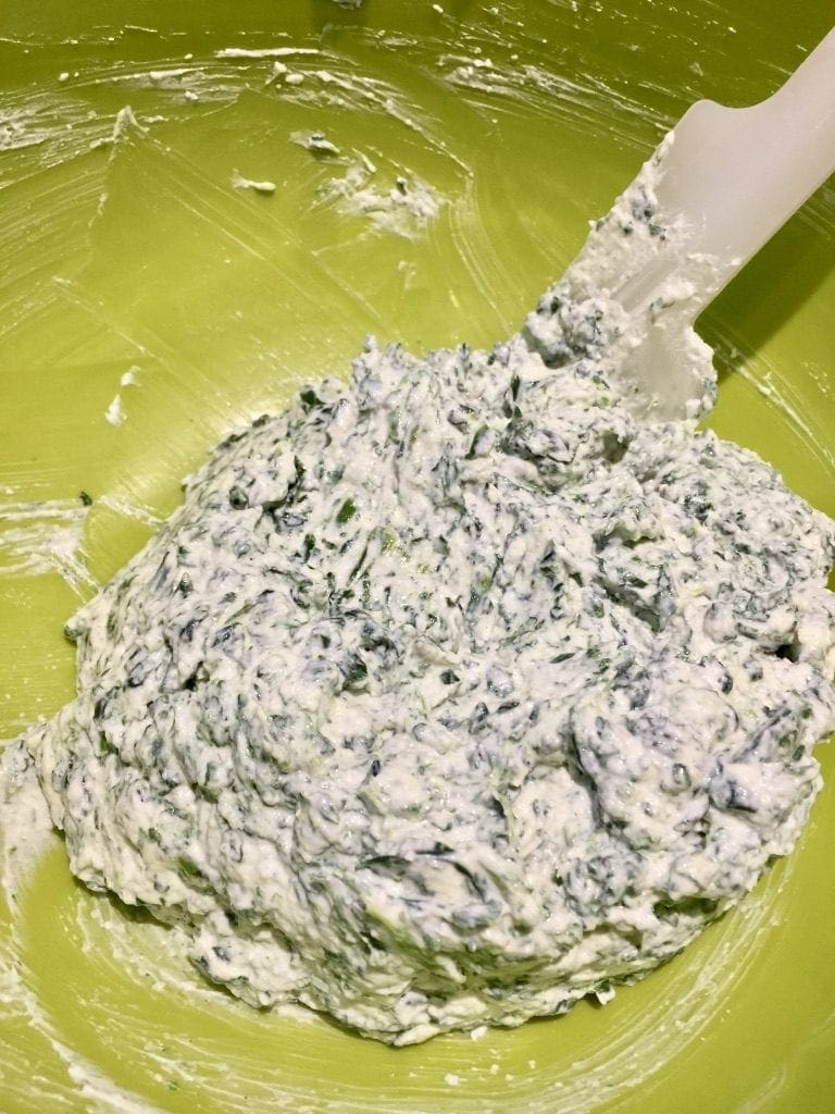 Spinach and ricotta filling in a bowl.