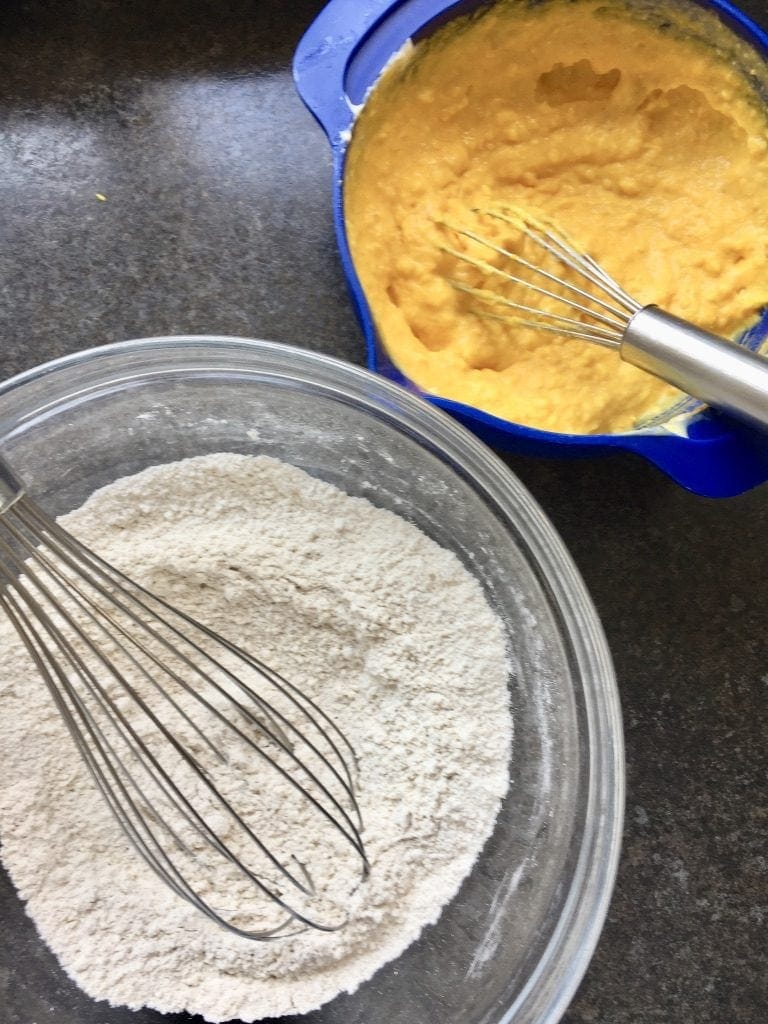 Bowl with flour and pumpkin puree mixture.