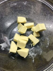 Chunks of butter in a bowl.
