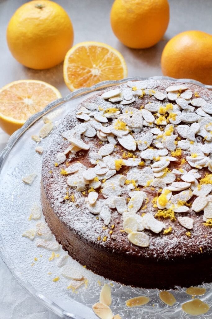 Whole Gluten-Free Orange and Almond Cake on a cake stand