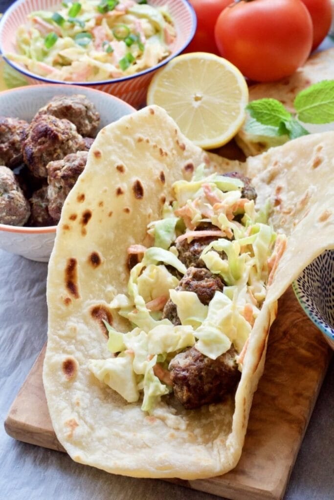 Easy Lamb Kofta Meatballs in a flat bread with coleslaw