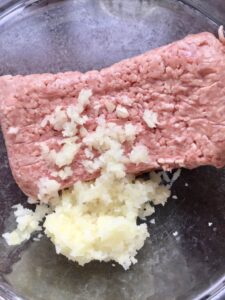 Easy Lamb Kofta Meatballs - adding onion and garlic to the mixture