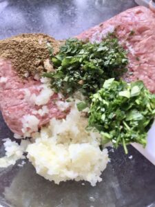 Easy Lamb Kofta Meatballs - adding chopped parsley to the mixture