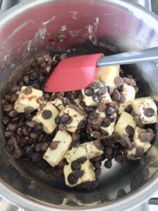 Chocolate Banana Cake - chocolate & butter in the saucepan being mixed