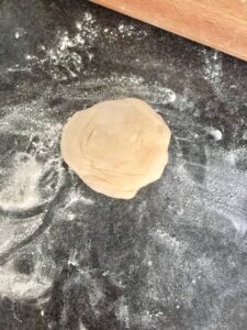 Easy Flatbread (No Yeast) - piece of dough ready to be rolled out