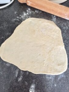 Easy Flatbread (No Yeast) rolled out on the kitchen surface