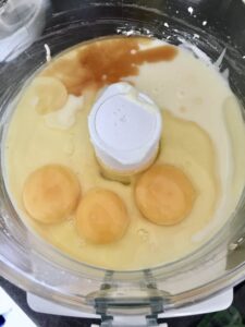 eggs, vanilla extract & curd cheese in a food processor