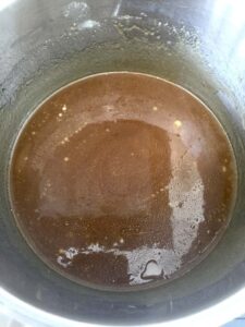 Melted butter, sugar and golden syrup in a pan
