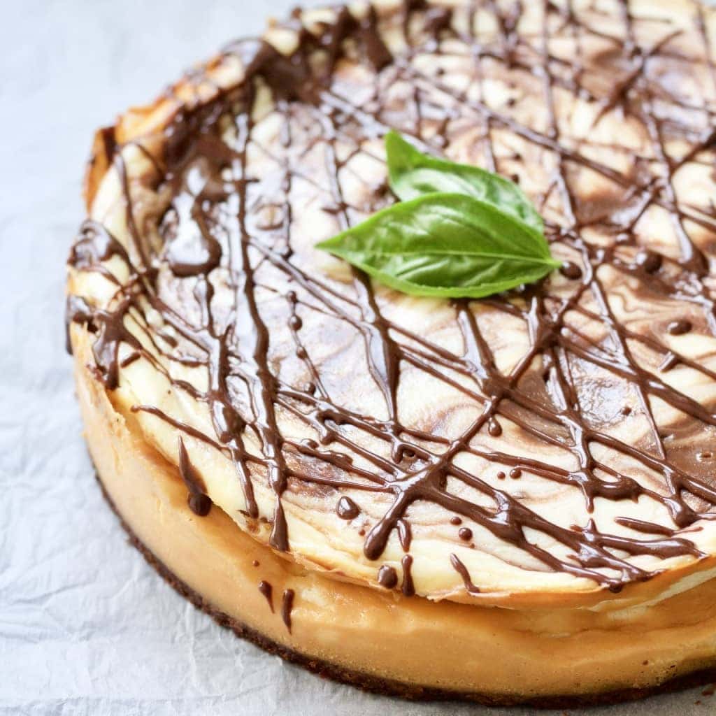 Close up of Chocolate Marble Cheesecake with Brownie Crust