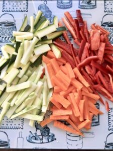 variety of veggies cut up into matchsticks