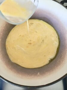 whisked eggs in a pan