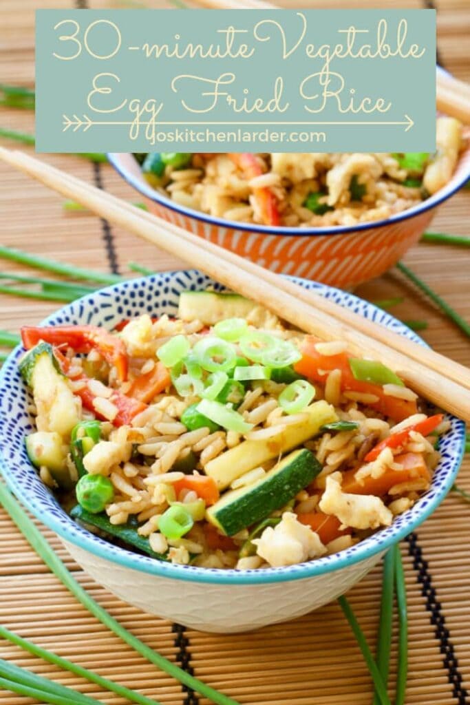 Vegetable Egg Fried Rice in a bowl with chopsticks