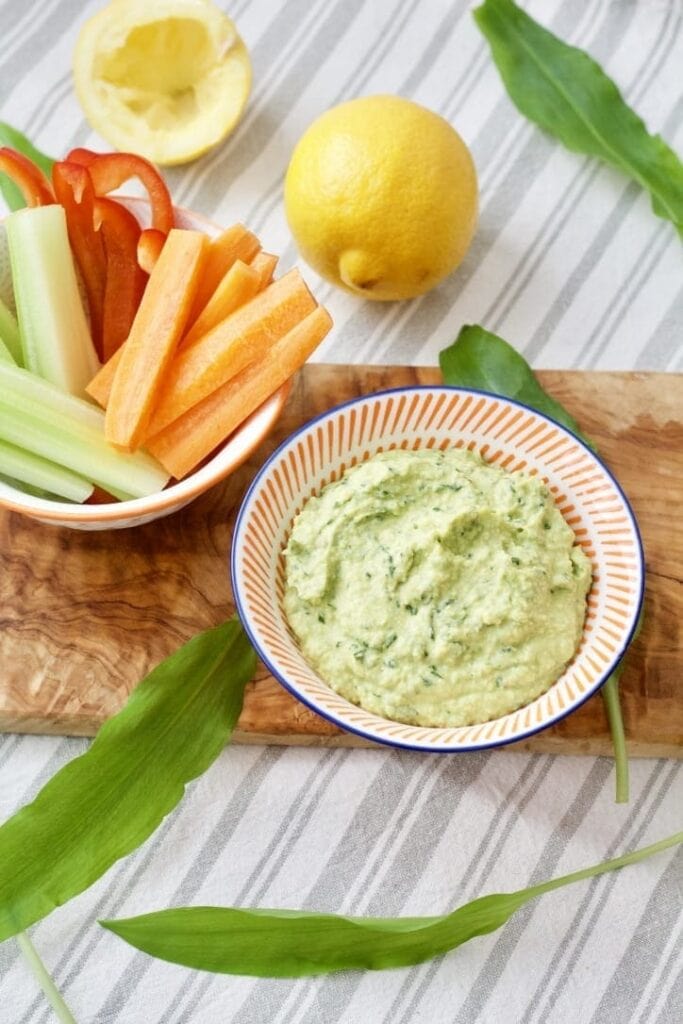 Wild Garlic Hummus in a bowl with crudités