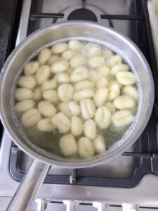 Gnocchi in a pan of boiling water