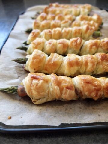 Asparagus Puff Pastry Twists on a baking tray