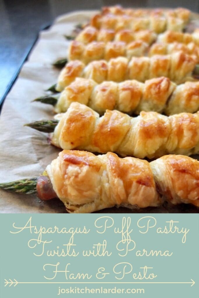 asparagus puff pastry twists on a baking tray