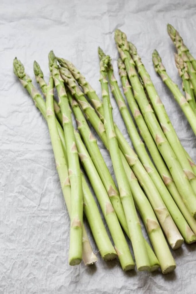 asparagus spears on a parchment