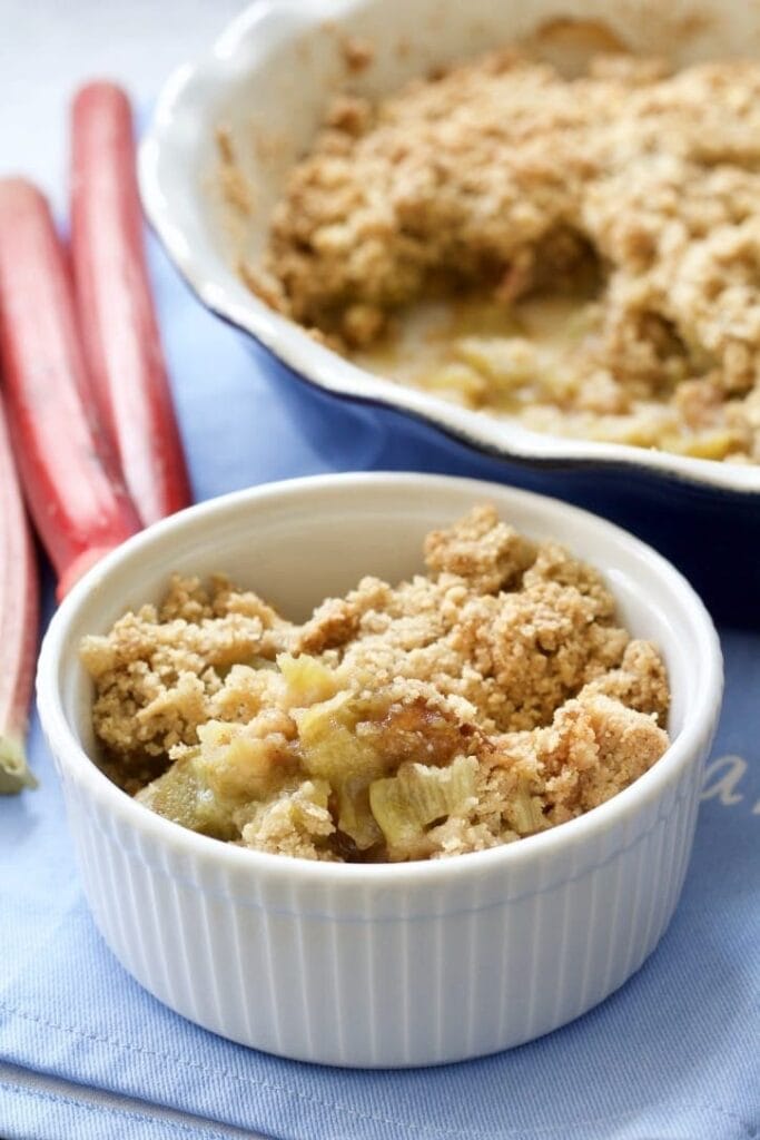 Rhubarb crumble in a bowl and in a dish.