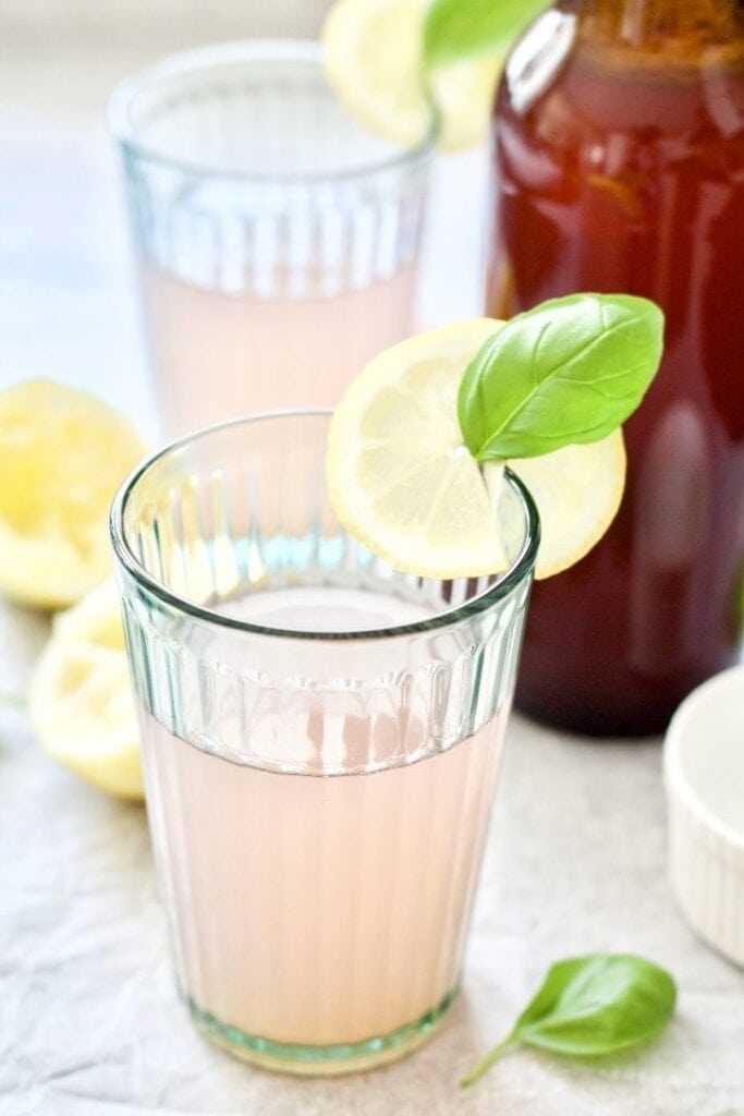 Glass filled with rhubarb cordial.