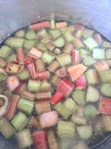 Rhubarb cooking in a pan.