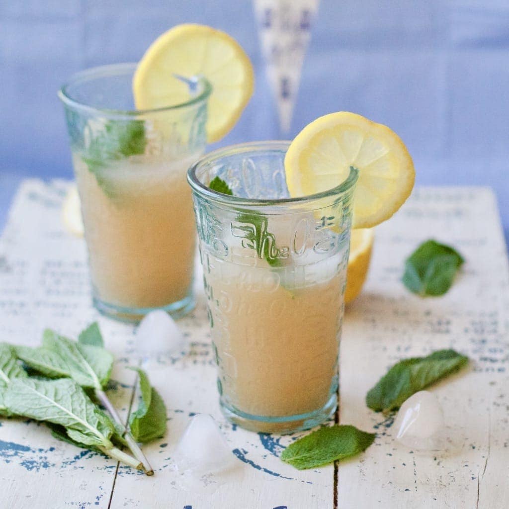 Rhubarb drink in 2 glasses.