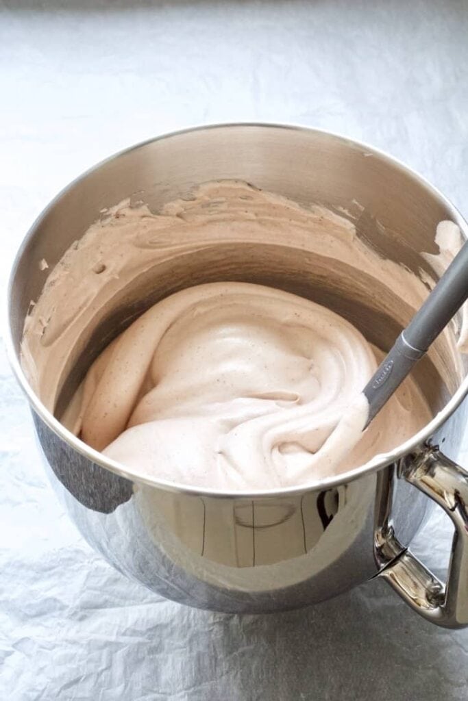 Ready chocolate pavlova mixture in a bowl.