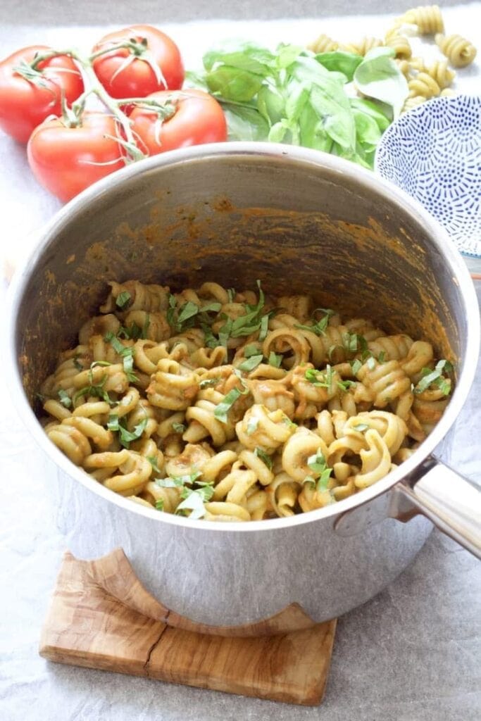 Roasted tomato & basil pasta in a pan.