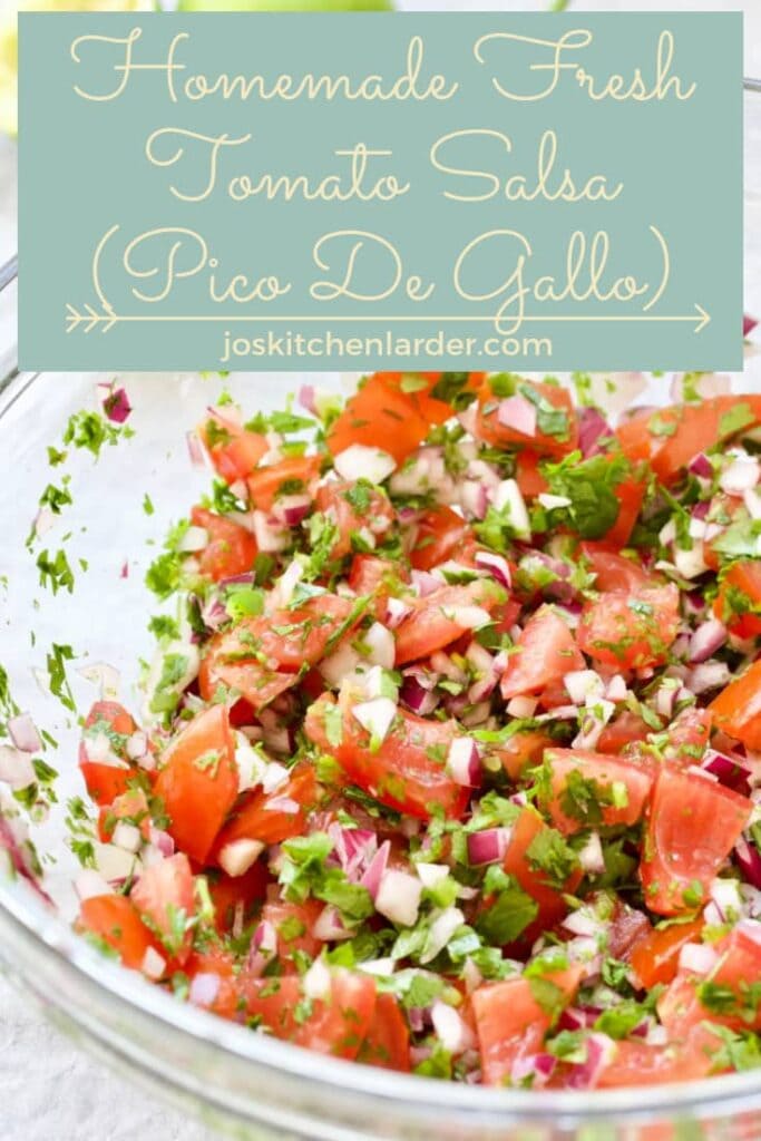 Fresh tomato salsa in a large glass bowl.