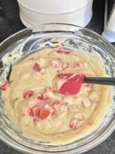 Strawberries mix into the muffin batter.