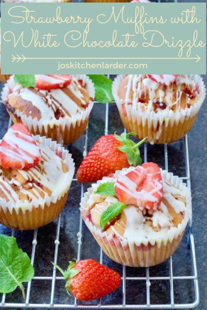 Strawberry muffins on a cooling rack.