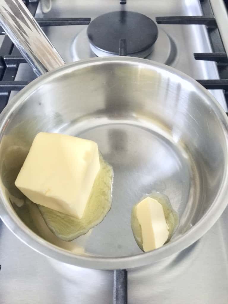 Butter being melted in a small pan.