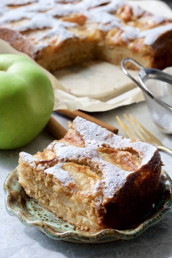 Slice of Dorset apple cake on a plate.