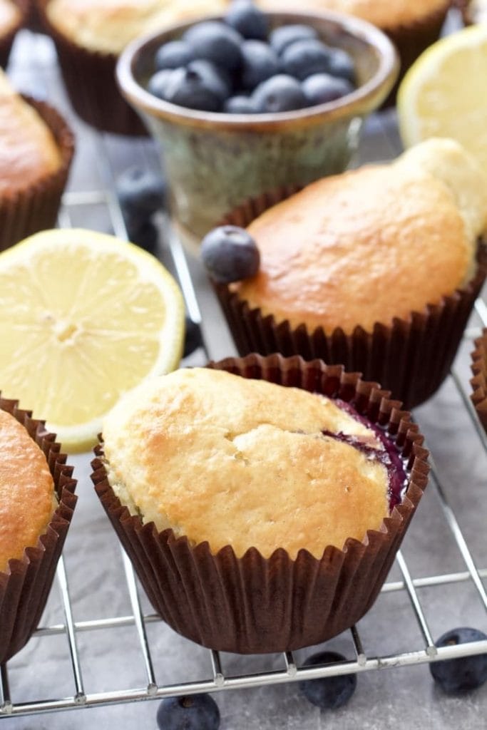 Close up of blueberry muffin on a cooling rack.