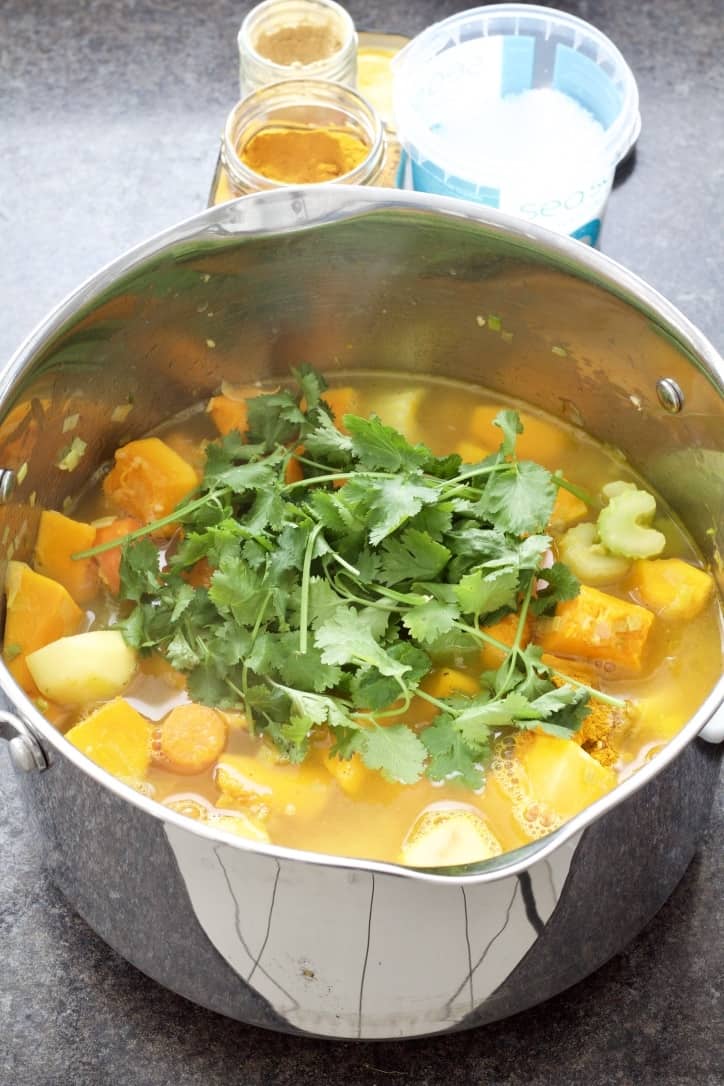 All the ingredients and stock in a large soup pot.