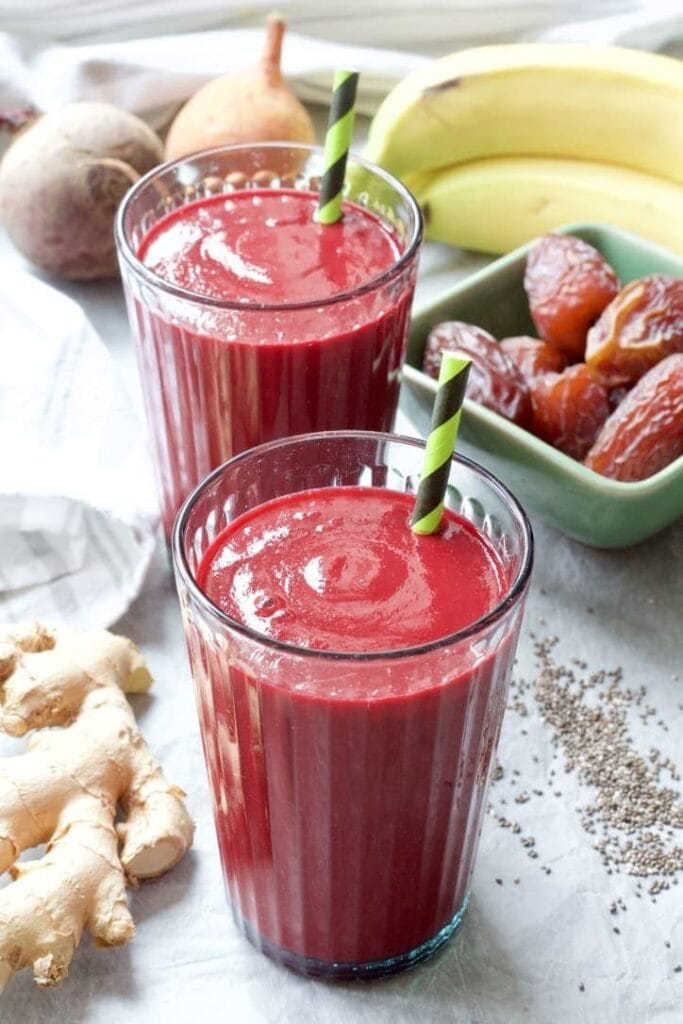 Smoothies in glasses with straws.