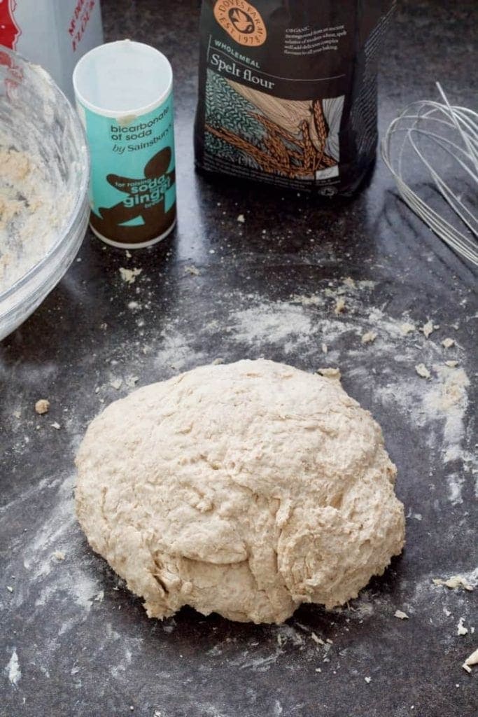 Soda bread dough formed into round.