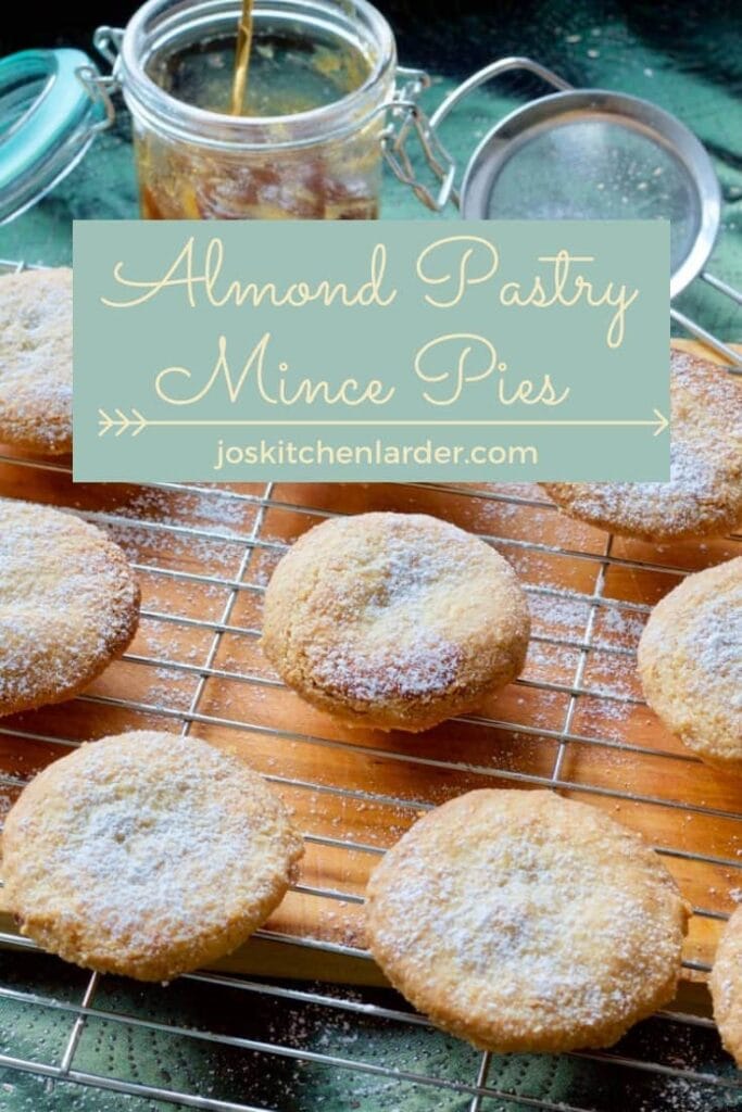 Mince pies on a cooling rack.