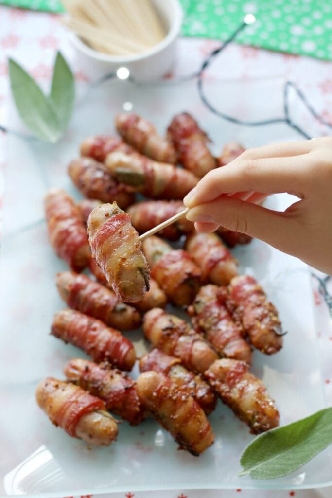 Cooked party sausage on a stick.