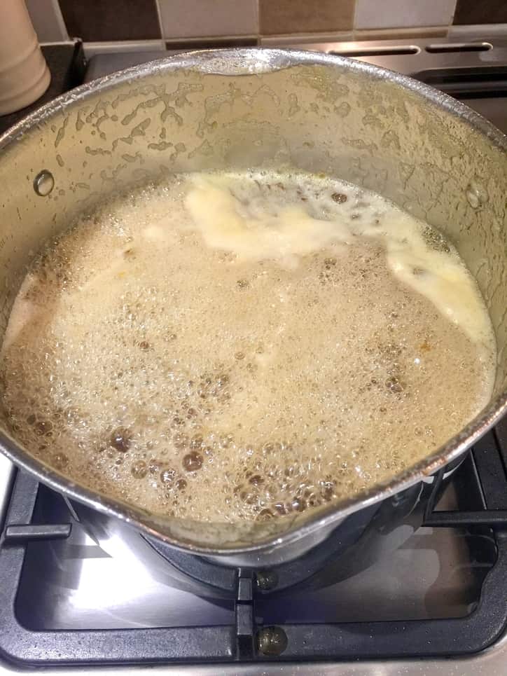 Boiling marmalade mixture.
