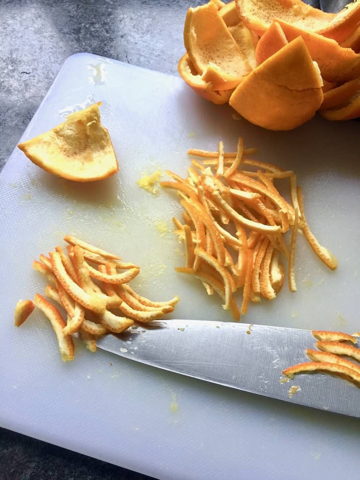 Thinly sliced orange rind.
