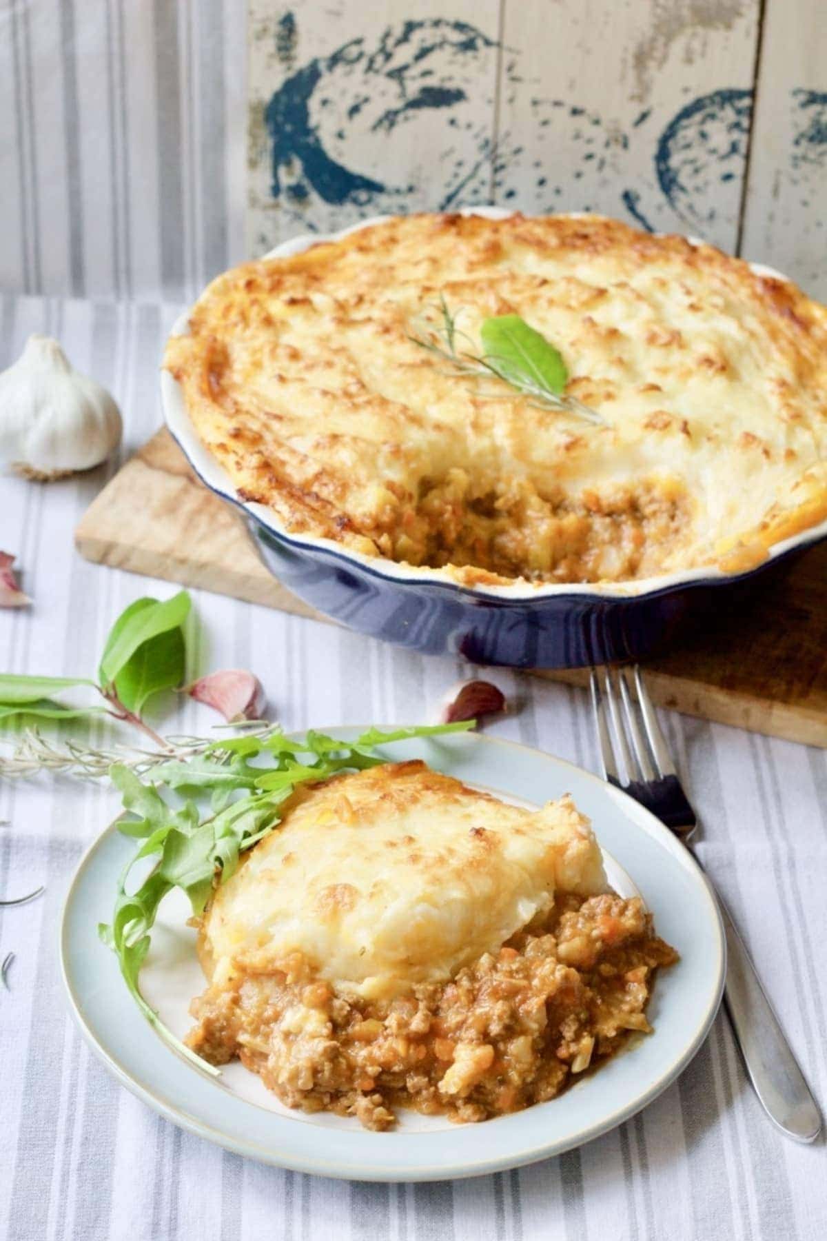 Shepherd's pie in a dish and portion on a plate.