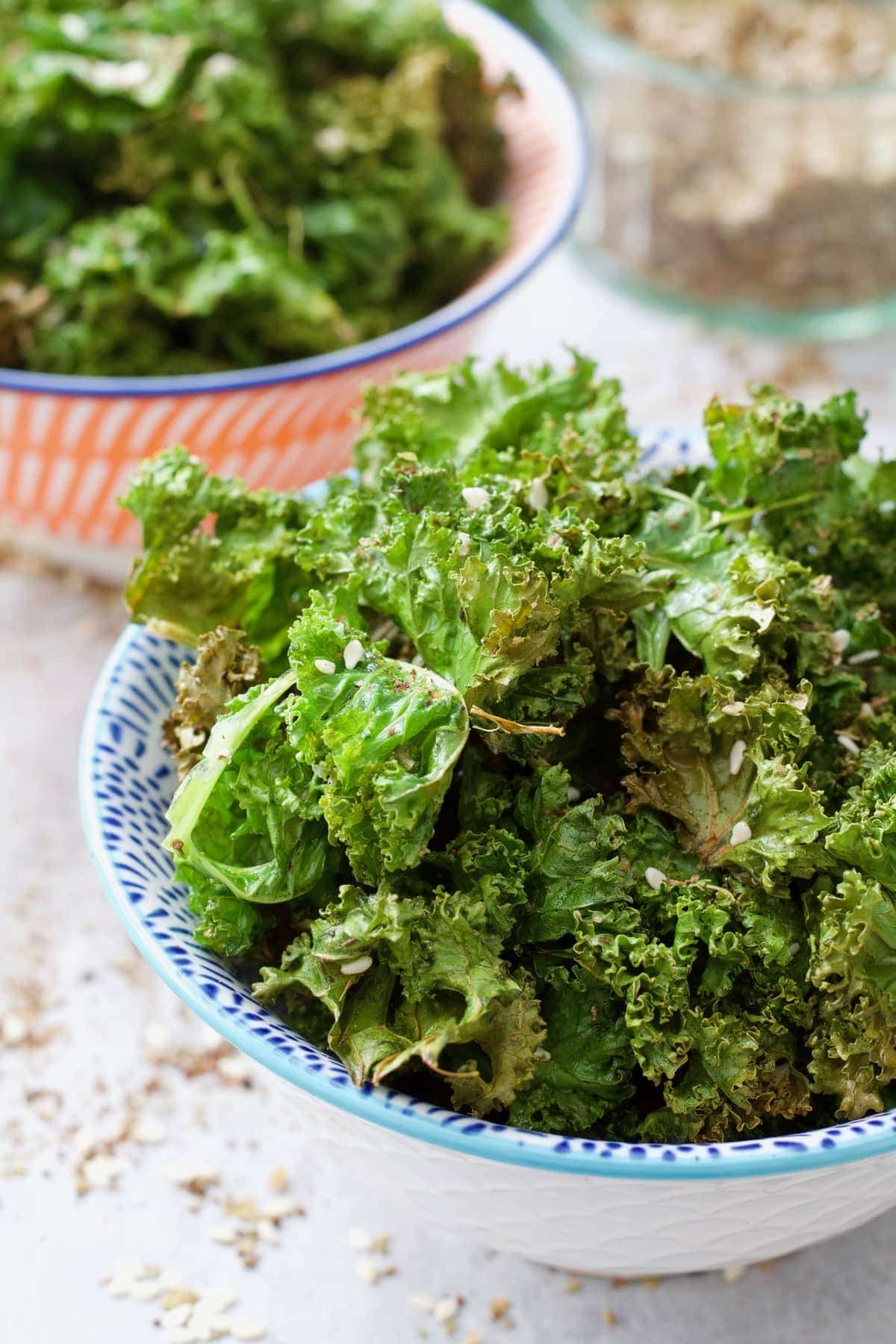 Close up of serving of kale chips in a bowl.