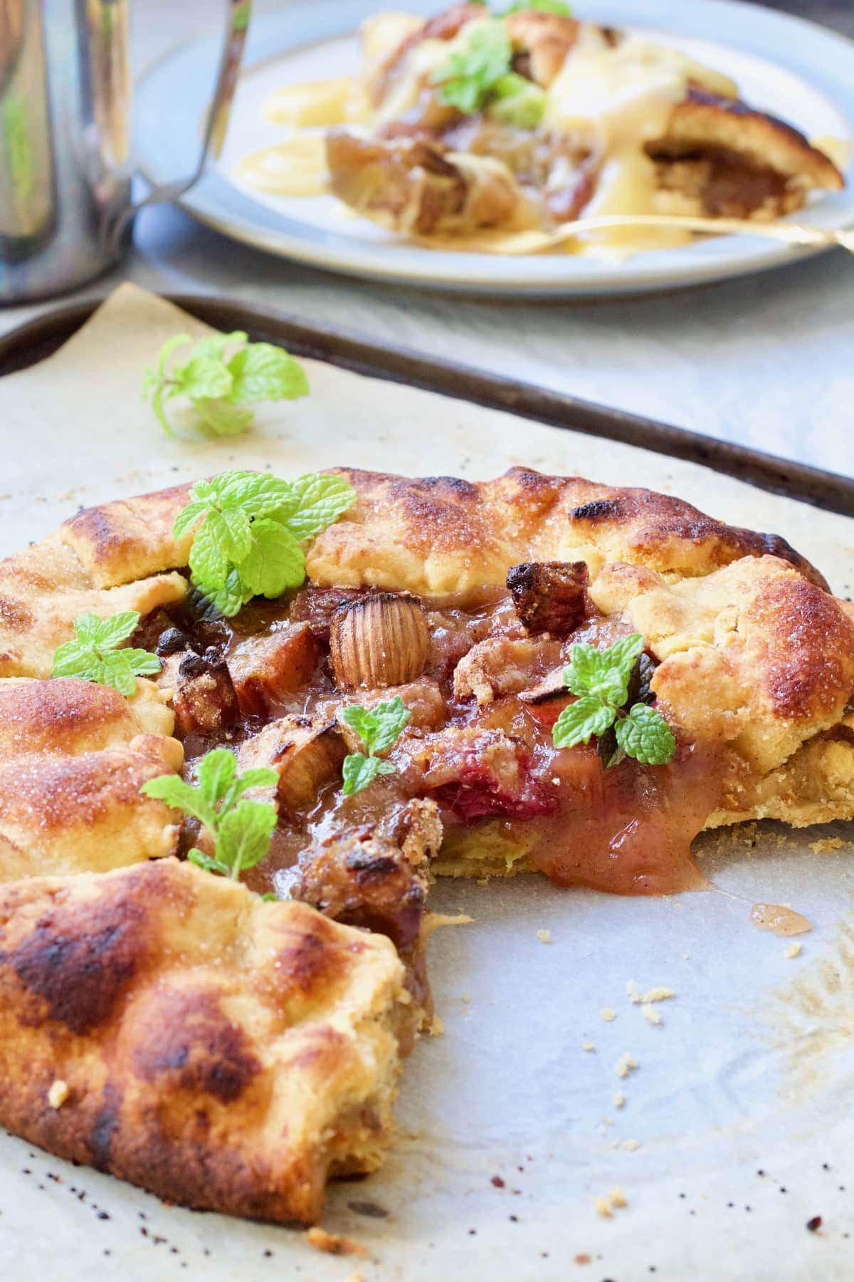 Rhubarb galette with a slice taken out.