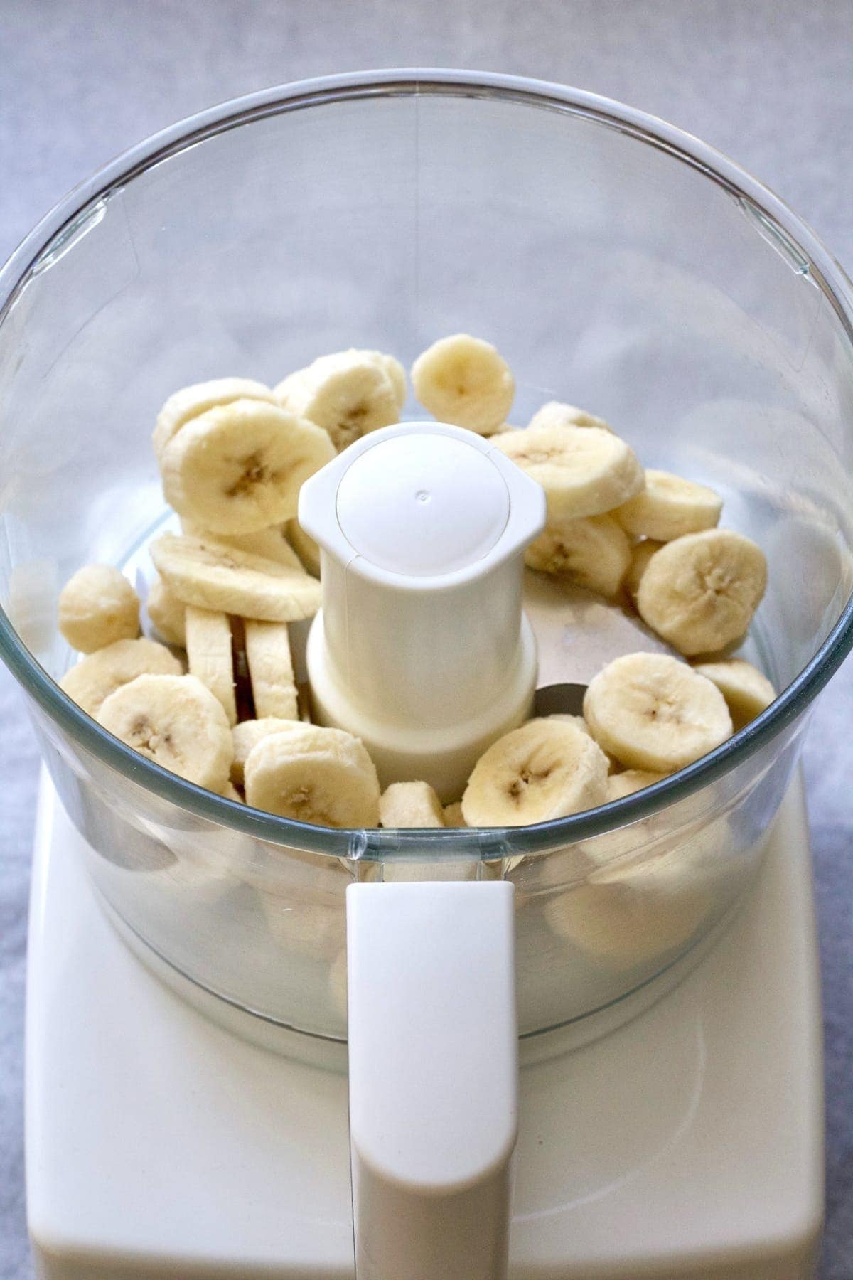 Banana slices in a food processor.