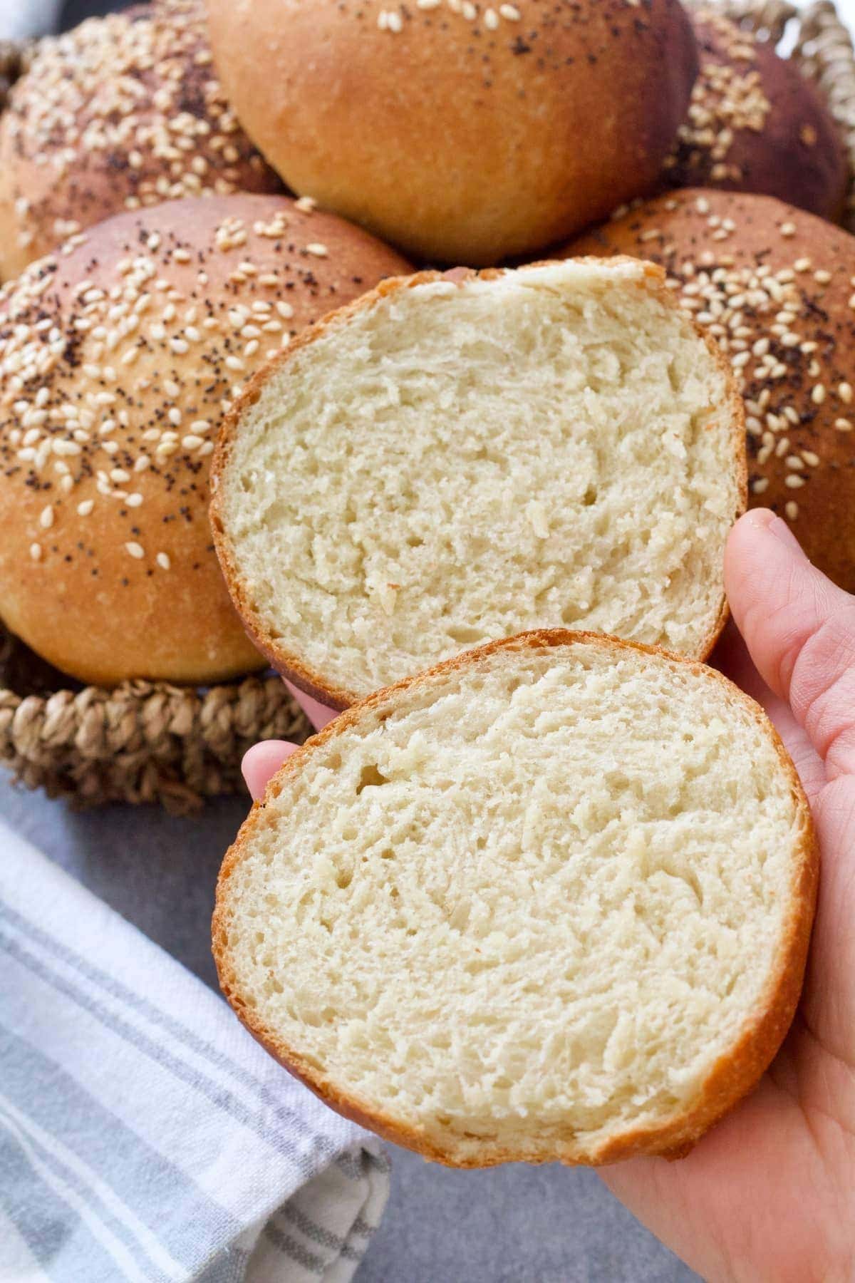 Bread roll cut in half showing the inside crumb.