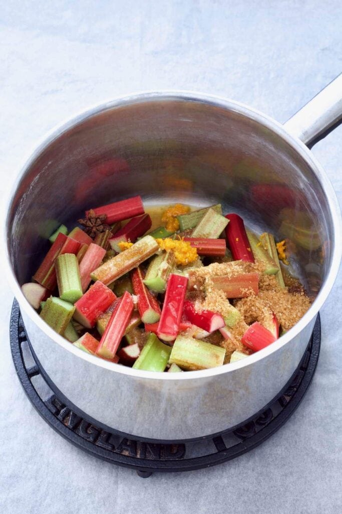 Chopped rhubarb & other ingredients in a pan.