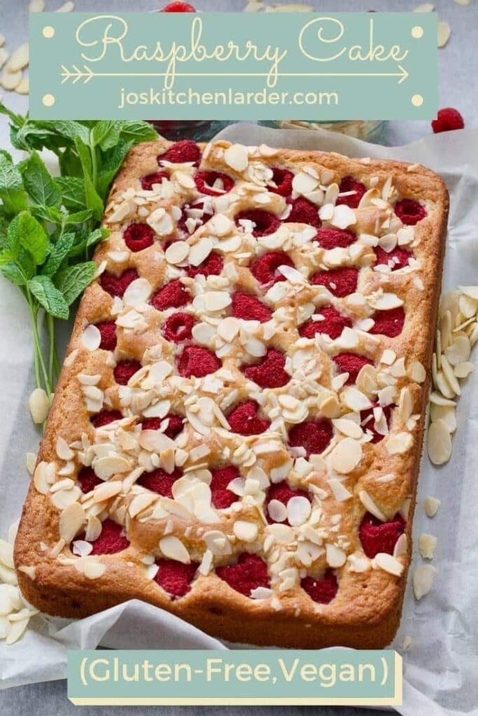 Whole raspberry cake with mint & flaked almonds.